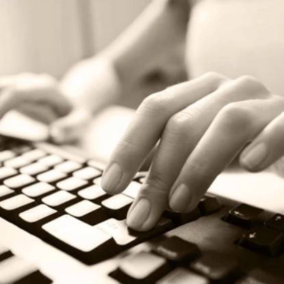 close-up of person typing